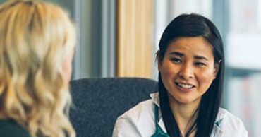 doctor speaking with patient about options for in-home services